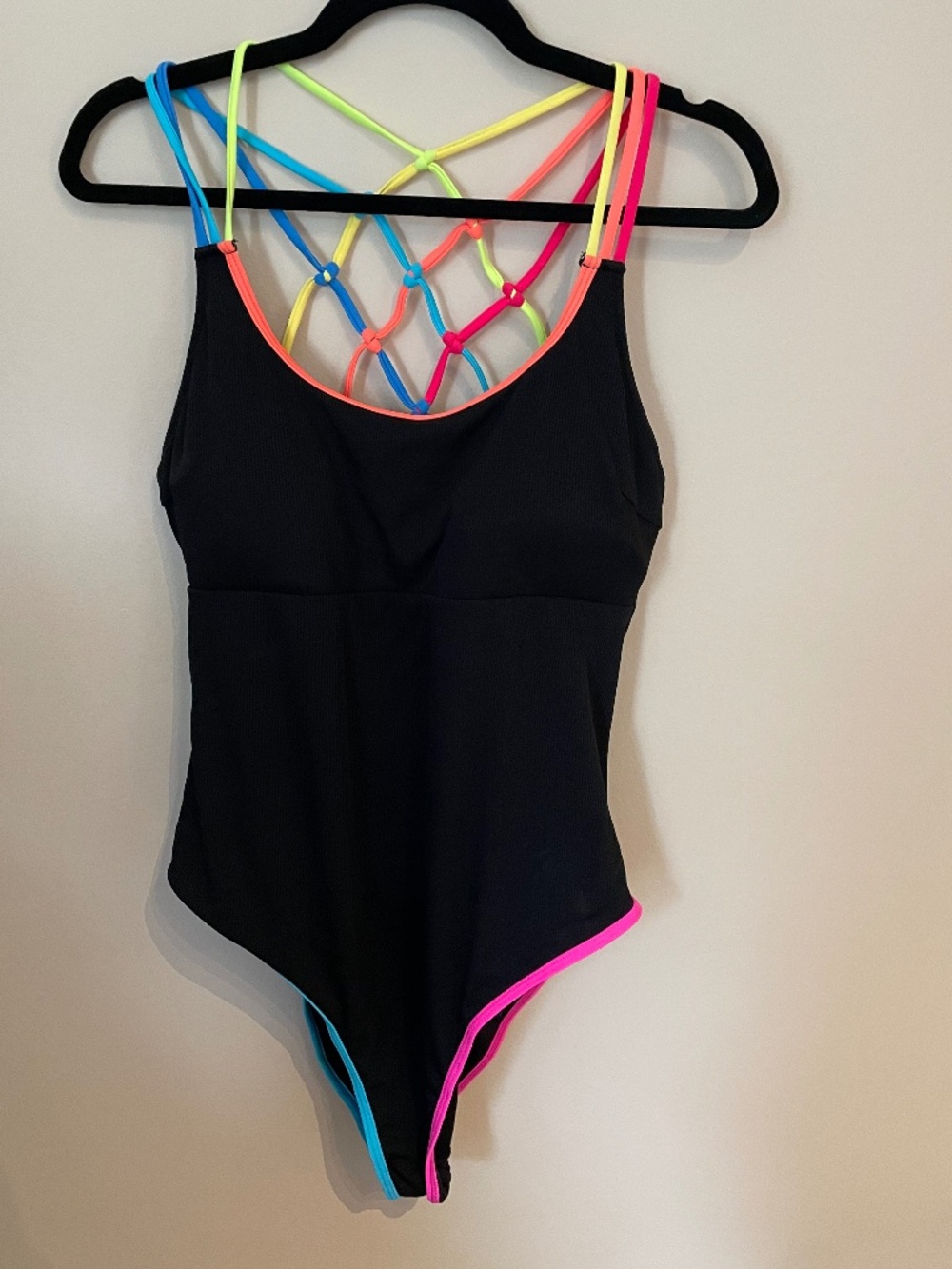 Black and neon strap one piece